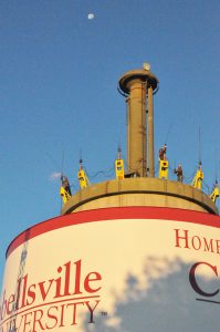 construction workers on water tower